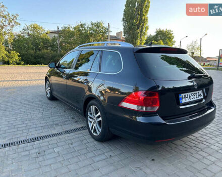 Черный Фольксваген Гольф, объемом двигателя 1.4 л и пробегом 148 тыс. км за 7800 $, фото 5 на Automoto.ua