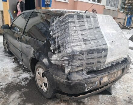 Черный Фольксваген Гольф, объемом двигателя 1.4 л и пробегом 300 тыс. км за 2000 $, фото 1 на Automoto.ua