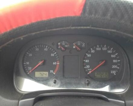 Червоний Фольксваген Гольф, об'ємом двигуна 1.39 л та пробігом 305 тис. км за 2800 $, фото 4 на Automoto.ua