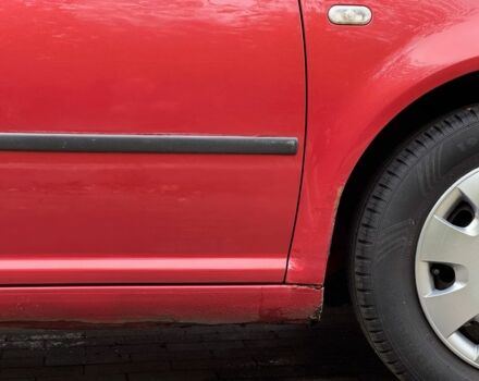 Фольксваген Гольф 2001 в Черкассах на Automoto.ua Красный Фольксваген Гольф, объемом двигателя 1.4 л и пробегом 209 тыс. км за 3400 $, фото 14 на Automoto.ua