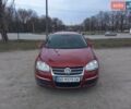 Красный Фольксваген Гольф, объемом двигателя 1.9 л и пробегом 323 тыс. км за 5800 $, фото 1 на Automoto.ua