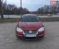 Красный Фольксваген Гольф, объемом двигателя 1.9 л и пробегом 300 тыс. км за 5800 $, фото 1 на Automoto.ua