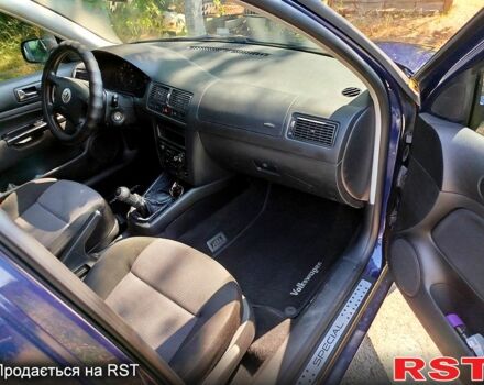 Синий Фольксваген Гольф, объемом двигателя 1.4 л и пробегом 218 тыс. км за 3500 $, фото 4 на Automoto.ua