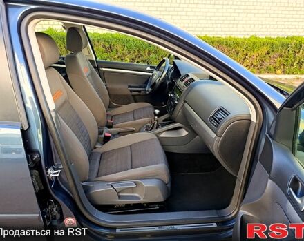 Синий Фольксваген Гольф, объемом двигателя 1.4 л и пробегом 187 тыс. км за 5800 $, фото 6 на Automoto.ua