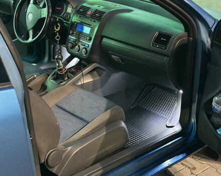 Фольксваген Гольф 2006 в Хмельницком на Automoto.ua Синий Фольксваген Гольф, объемом двигателя 1.99 л и пробегом 250 тыс. км за 5500 $, фото 11 на Automoto.ua