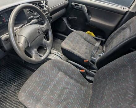 Синий Фольксваген Гольф, объемом двигателя 1.9 л и пробегом 300 тыс. км за 2500 $, фото 2 на Automoto.ua