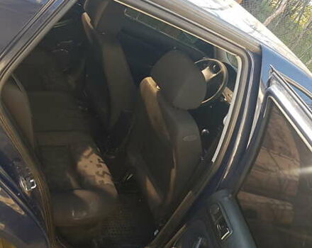 Синий Фольксваген Гольф, объемом двигателя 1.4 л и пробегом 100 тыс. км за 3500 $, фото 4 на Automoto.ua