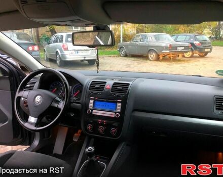 Синий Фольксваген Гольф, объемом двигателя 1.4 л и пробегом 244 тыс. км за 5800 $, фото 5 на Automoto.ua