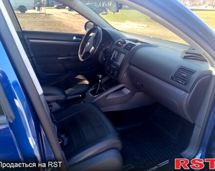 Синий Фольксваген Гольф, объемом двигателя 1.4 л и пробегом 200 тыс. км за 5600 $, фото 1 на Automoto.ua