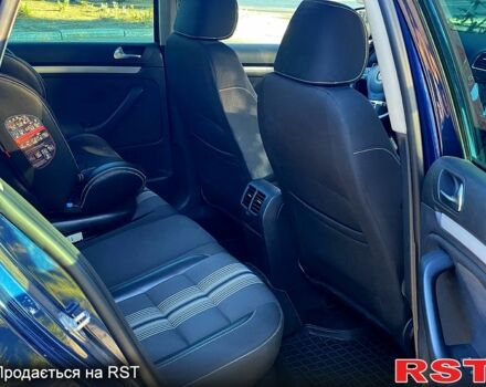 Синий Фольксваген Гольф, объемом двигателя 2 л и пробегом 210 тыс. км за 9400 $, фото 10 на Automoto.ua