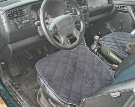 Зеленый Фольксваген Гольф, объемом двигателя 1.8 л и пробегом 300 тыс. км за 1900 $, фото 4 на Automoto.ua