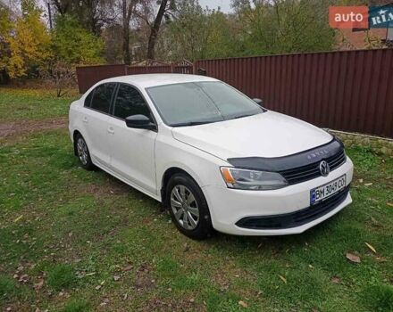 Фольксваген Джетта 2012 у Ромнах на Automoto.ua Білий Фольксваген Джетта, об'ємом двигуна 1.98 л та пробігом 262 тис. км за 7500 $, фото 7 на Automoto.ua