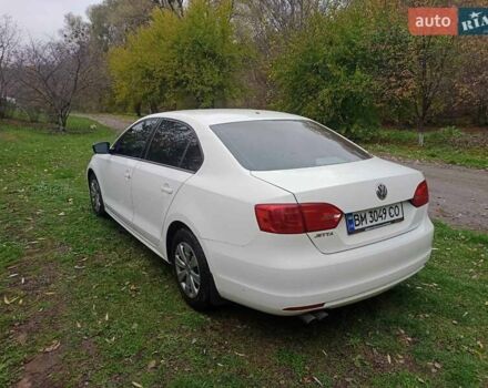 Фольксваген Джетта 2012 у Ромнах на Automoto.ua Білий Фольксваген Джетта, об'ємом двигуна 1.98 л та пробігом 262 тис. км за 7500 $, фото 3 на Automoto.ua