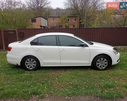 Фольксваген Джетта 2012 у Ромнах на Automoto.ua Білий Фольксваген Джетта, об'ємом двигуна 1.98 л та пробігом 262 тис. км за 7500 $, фото 6 на Automoto.ua