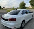 Білий Фольксваген Джетта, об'ємом двигуна 1.39 л та пробігом 128 тис. км за 9400 $, фото 2 на Automoto.ua