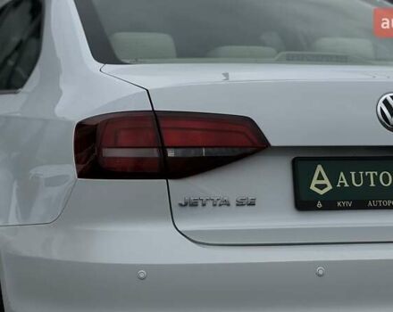 Белый Фольксваген Джетта, объемом двигателя 1.39 л и пробегом 74 тыс. км за 13500 $, фото 38 на Automoto.ua