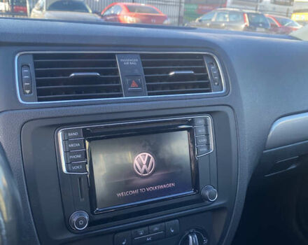 Белый Фольксваген Джетта, объемом двигателя 1.4 л и пробегом 66 тыс. км за 14000 $, фото 5 на Automoto.ua