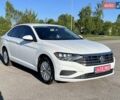 Білий Фольксваген Джетта, об'ємом двигуна 1.4 л та пробігом 103 тис. км за 14800 $, фото 1 на Automoto.ua