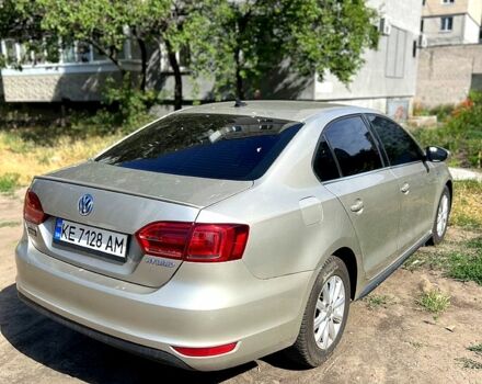Бежевый Фольксваген Джетта, объемом двигателя 1.4 л и пробегом 148 тыс. км за 7799 $, фото 1 на Automoto.ua