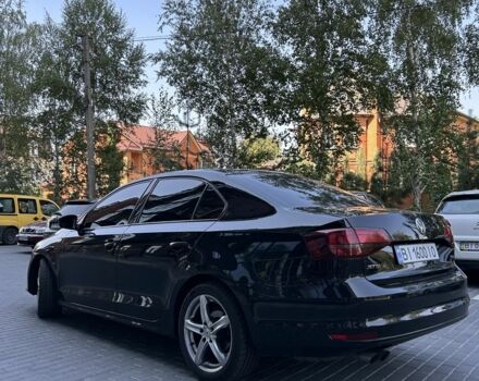 Черный Фольксваген Джетта, объемом двигателя 1.4 л и пробегом 160 тыс. км за 7900 $, фото 5 на Automoto.ua