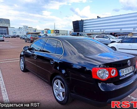 Черный Фольксваген Джетта, объемом двигателя 2 л и пробегом 318 тыс. км за 4999 $, фото 2 на Automoto.ua