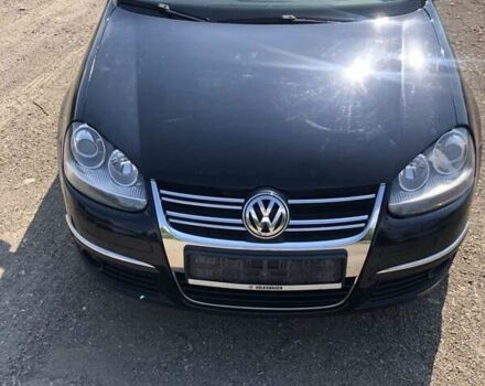 Чорний Фольксваген Джетта, об'ємом двигуна 1.39 л та пробігом 157 тис. км за 5300 $, фото 4 на Automoto.ua