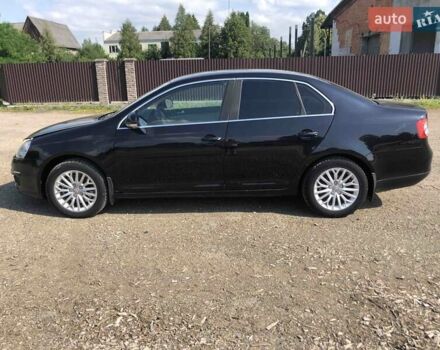 Чорний Фольксваген Джетта, об'ємом двигуна 1.39 л та пробігом 157 тис. км за 5300 $, фото 2 на Automoto.ua