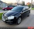 Черный Фольксваген Джетта, объемом двигателя 1.4 л и пробегом 200 тыс. км за 5999 $, фото 1 на Automoto.ua
