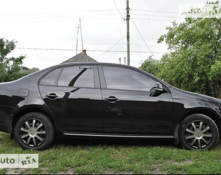 Черный Фольксваген Джетта, объемом двигателя 1.4 л и пробегом 280 тыс. км за 6500 $, фото 2 на Automoto.ua