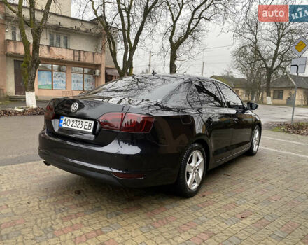 Черный Фольксваген Джетта, объемом двигателя 1.2 л и пробегом 112 тыс. км за 7800 $, фото 6 на Automoto.ua