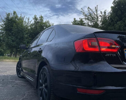 Чорний Фольксваген Джетта, об'ємом двигуна 1.39 л та пробігом 199 тис. км за 8499 $, фото 7 на Automoto.ua