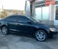 Чорний Фольксваген Джетта, об'ємом двигуна 2 л та пробігом 219 тис. км за 8990 $, фото 2 на Automoto.ua