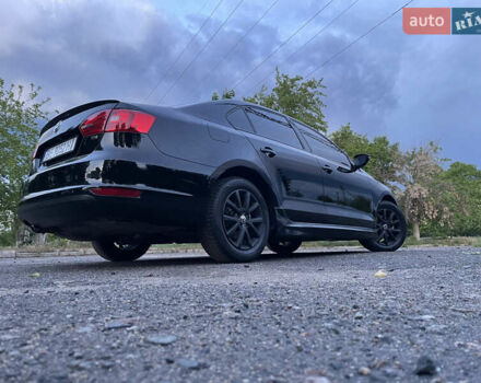 Чорний Фольксваген Джетта, об'ємом двигуна 1.39 л та пробігом 199 тис. км за 8499 $, фото 1 на Automoto.ua