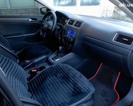 Чорний Фольксваген Джетта, об'ємом двигуна 2 л та пробігом 219 тис. км за 8990 $, фото 28 на Automoto.ua