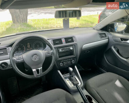 Чорний Фольксваген Джетта, об'ємом двигуна 1.39 л та пробігом 199 тис. км за 8499 $, фото 36 на Automoto.ua