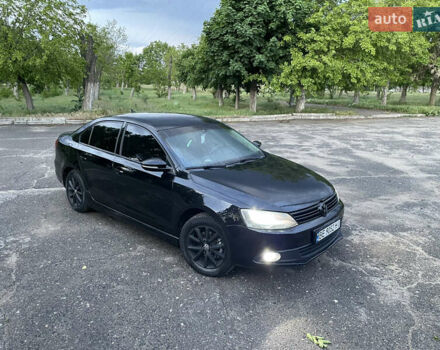 Чорний Фольксваген Джетта, об'ємом двигуна 1.39 л та пробігом 199 тис. км за 8499 $, фото 5 на Automoto.ua
