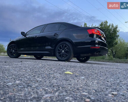 Чорний Фольксваген Джетта, об'ємом двигуна 1.39 л та пробігом 199 тис. км за 8499 $, фото 3 на Automoto.ua