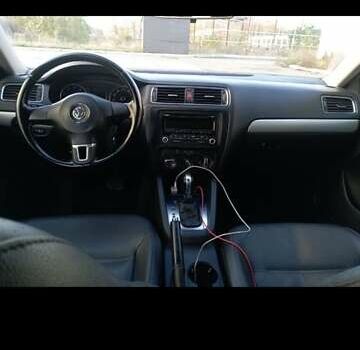 Фольксваген Джетта 2012 в Чернигове на Automoto.ua Черный Фольксваген Джетта, объемом двигателя 2.48 л и пробегом 225 тыс. км за 8600 $, фото 1 на Automoto.ua