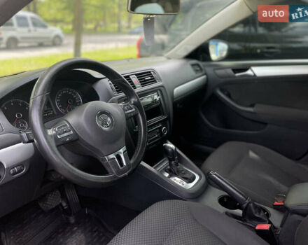 Чорний Фольксваген Джетта, об'ємом двигуна 1.39 л та пробігом 199 тис. км за 8499 $, фото 35 на Automoto.ua