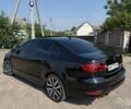 Чорний Фольксваген Джетта, об'ємом двигуна 2 л та пробігом 193 тис. км за 9700 $, фото 4 на Automoto.ua