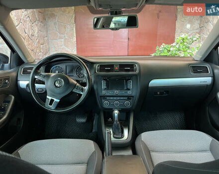 Фольксваген Джетта 2013 в Тернополе на Automoto.ua Черный Фольксваген Джетта, объемом двигателя 1.4 л и пробегом 205 тыс. км за 13000 $, фото 8 на Automoto.ua