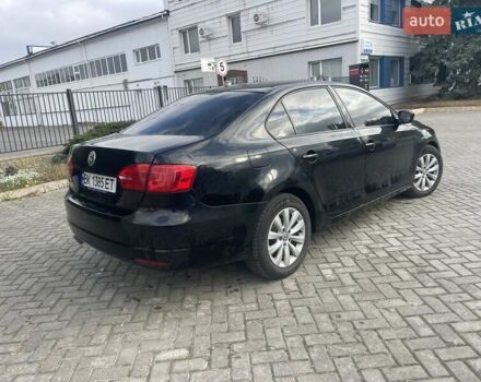 Чорний Фольксваген Джетта, об'ємом двигуна 2 л та пробігом 199 тис. км за 6900 $, фото 5 на Automoto.ua