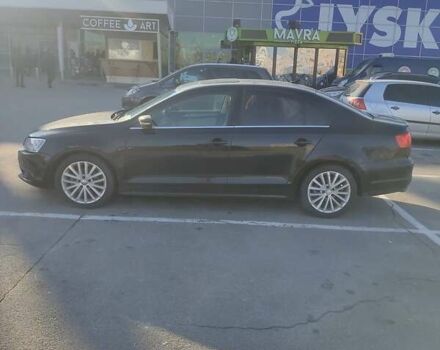 Фольксваген Джетта 2013 в Запорожье на Automoto.ua Черный Фольксваген Джетта, объемом двигателя 1.8 л и пробегом 150 тыс. км за 9200 $, фото 8 на Automoto.ua