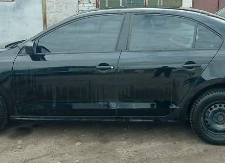 Фольксваген Джетта 2013 в Изюме на Automoto.ua Черный Фольксваген Джетта, объемом двигателя 1.98 л и пробегом 98 тыс. км за 8800 $, фото 6 на Automoto.ua