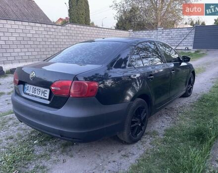 Чорний Фольксваген Джетта, об'ємом двигуна 2 л та пробігом 177 тис. км за 6950 $, фото 4 на Automoto.ua