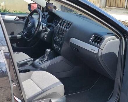 Черный Фольксваген Джетта, объемом двигателя 1.4 л и пробегом 253 тыс. км за 8900 $, фото 8 на Automoto.ua