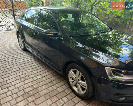 Фольксваген Джетта 2013 в Тернополе на Automoto.ua Черный Фольксваген Джетта, объемом двигателя 1.4 л и пробегом 205 тыс. км за 13000 $, фото 1 на Automoto.ua