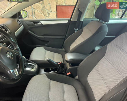 Фольксваген Джетта 2013 в Тернополе на Automoto.ua Черный Фольксваген Джетта, объемом двигателя 1.4 л и пробегом 205 тыс. км за 13000 $, фото 7 на Automoto.ua