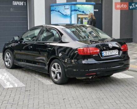 Фольксваген Джетта 2013 в Львове на Automoto.ua Черный Фольксваген Джетта, объемом двигателя 1.98 л и пробегом 228 тыс. км за 7999 $, фото 9 на Automoto.ua