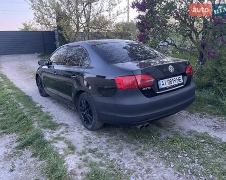 Чорний Фольксваген Джетта, об'ємом двигуна 2 л та пробігом 177 тис. км за 6950 $, фото 5 на Automoto.ua